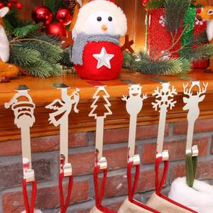 lot 4092 image: Ripeng 6 Pieces Christmas Stocking Hanger for Mantel Christmas Mantel Decorations Fireplace Holder Clips Xmas 6 Styles Stocking Hanging Holders for Xmas Home Supplies(Silver)