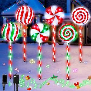 lot 17197 image: ElectricWise 6 in 1 Lollipop Christmas Pathway Lights Outdoor, 29 Inch Peppermint Pathway Markers Lights, Lighted Candy Cane with 5 Modes and Music for Xmas Holiday Patio Yard Garden(Mixed Color)