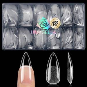 lot 18273 image: UNA GELLA Medium Stiletto Gel Nail Tips 600Pcs, Medium Stiletto Press on Nails Almond Shape Pre Etched Full Cover Soft Gel Nails Tips for Nail Extensions DIY Art Salon 12 Sizes at Home