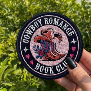 lot 51235 image: Cowboy Romance Book Club Patch 3 Inches Funny Cowboy Boots, Western Cowboy, Country Girl Humor Iron OnSew On Embroidery Fabric Applique Patches for Trucker Hats Clothes Backpack DIY Accessories Gifts - Retail $9