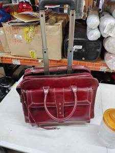 lot 18774 image: Rolling Carry On Laptop