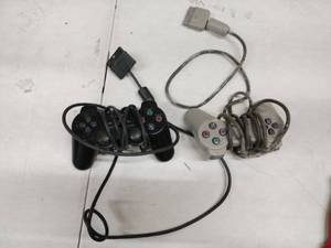 lot 18779 image: Sony Playstation Analog Controller - Set of 2