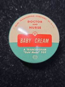 lot 55 image: Transogram Doctor and Nurse Baby Cream Toy Container