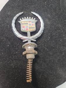 lot 97 image: Vintage official Cadillac Hood Ornament with Wreath