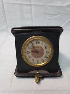 lot 100 image: Tavannes 8 Day Travel Clock in Black Case