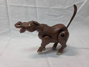 lot 129 image: 1920s Brown Metal Nodding Donkey Figure