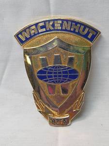 lot 131 image: 1970s Wackenhut Security Badge #9775