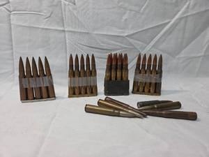 lot 142 image: M1 Garand En-Bloc Clips with 30-06 Ammunition