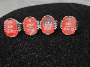 lot 150 image: The Beatles Band Members Ring Set Holographic Rings