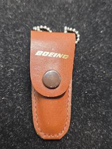 lot 187 image: Boeing Promotional Nail Clipper with Leather Case