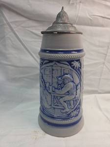 lot 222 image: German Beer Stein with Blue Relief Scene