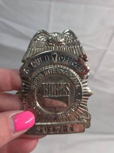 lot 234 image: Burns International Security Badge #501-04