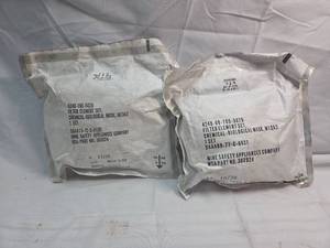 lot 235 image: MSA M13A2 Chemical-Biological Mask Filter Element Set