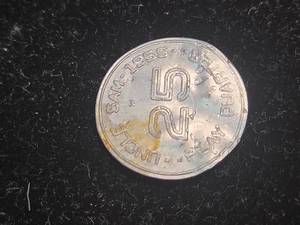 lot 375 image: 1959 SAM.TSS Money Money Quarter Token