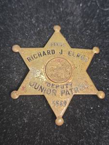 lot 382 image: Sheriff Deputy Junior Patrol Badge #5569