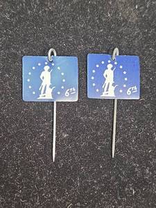 lot 396 image: 1944 6th War Loan Minuteman Pin Set