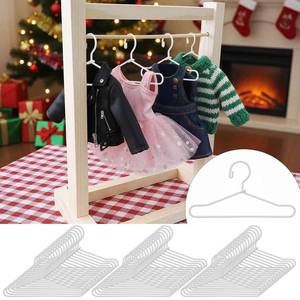 lot 897 image: Jenaai 30 Pcs Doll Clothes Hanger 2.56 in Metal White Doll Outfit Hanger Mini Clothes Hangers for Wardrobe, Dresses, Skirts, and Accessories - Retail $14