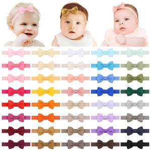 lot 899 image: jollybows 40pcs Baby Girls Bows Headbands Elastic Hairband Ribbon Bow Hair Accessories for Newborns Infants Toddlers and Kids - Retail $10