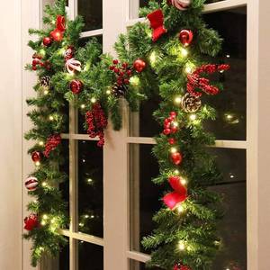 lot 15829 image: MorTime 9 FT LED Christmas Garland with Pinecones Red Berries Bows Christmas Balls Candies, Multi-Function Christmas Garland with 50 Warm White LED Lights, 180 Branch Tips - Retail $36