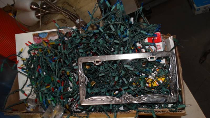 lot 20232 image: Lot of christmas lights, caulking, puzzle