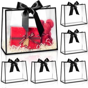 lot 55192 image: 12 Pack Clear Plastic Gift Bags with Handles, Reusable Party Favor Bags with Ribbon for Wedding, Bachelorette Party, 12 x 10 x 5 Inch (Black) - Retail $17