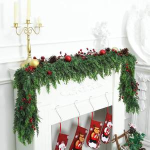 lot 55312 image: Christmas Cedar Garland with Soft Thickness Pine, Thick and Lush, Artificial Green Faux Cedar Pine Garland for Christmas Winter Home Mantel Fireplace Holiday Party Decor (9ft) - Retail $36