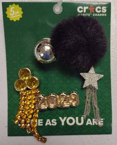 lot 203 image: Crocs Jibbitz 2023 New Year Charm Set