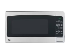 lot 24 image: GE Countertop Microwave Oven - Retail $260