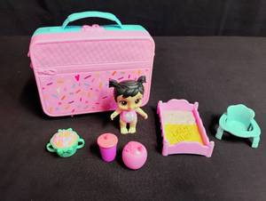 lot 1504 image: Baby Alive Doll with Pink Carrier Set