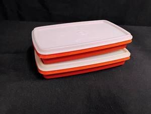 lot 1626 image: Two Vintage Orange Tupperware Containers 9 x 5 with Lids