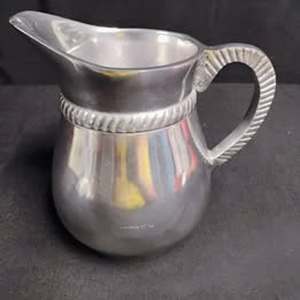 lot 1658 image: Silver Toned Pitcher