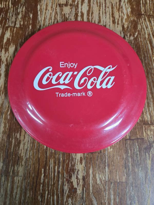 lot 27 image: Coca-Cola Logo Plastic Flying Disc Frisbee