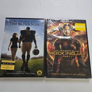lot 101 image: The Blind Side & Hunger Games Mockingjay Part 1 DVD Bundle - New