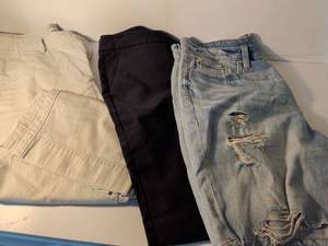 lot 32 image: Mixed Denim Bundle - White, Black, and Distressed Blue Jeans  Size 10 - 14