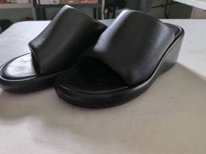 lot 141 image: Balenciaga Black Leather Platform Slides