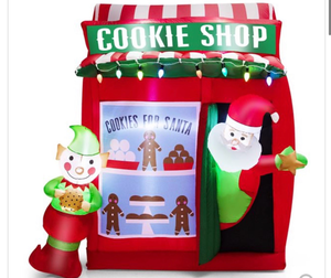 lot 3309 image: Costway 6.3-ft H Lighted Inflatable Gingerbread Cookie Shop with Santa Clause - Retail $0