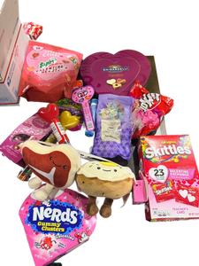 Box of candy ( Ghirardelli chocolates, Skittles Valentine exchange packs, Nerds Gummy Clusters, plush food characters, Kit Kats and more! Perfect for classroom exchanges or gift giving. - Retail: $25