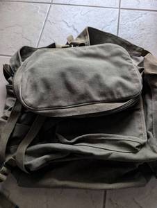 lot 1216 image: Military Style Canvas Backpack with Multiple Compartments