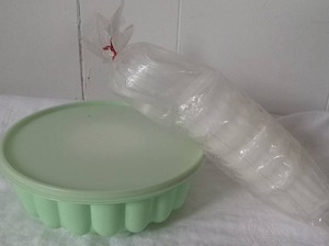 lot 2009 image: Tupperware with Bubble Design  Plastic Containers