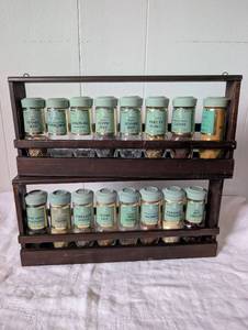 lot 2015 image: Two Wooden Spice Racks with Green Schilling Spice Jars