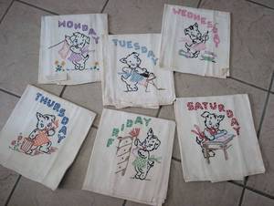 lot 2089 image: Embroidered Days of the Week Tea Towels