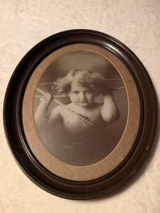 lot 2524 image: Oval Framed Sepia Cupid Awake Print- 10 in&nbsp