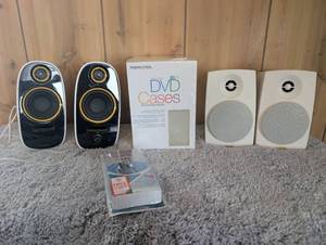 lot 3002 image: Home Audio Bundle - Speakers, DVD Cases & Earphones