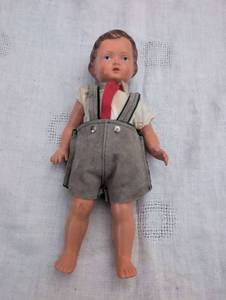 lot 5058 image: 1940s German Celluloid Doll in Traditional Outfit