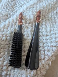 lot 6001 image: Decorative Horse Head Boot Brushes Set