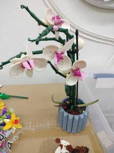 lot 1028 image: the LEGO Icons Orchid Plant and Flowers Set 10311