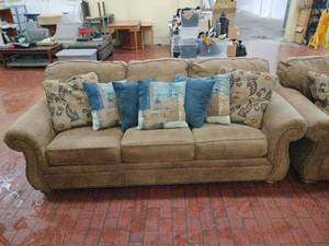 lot 1054 image: Tan Microfiber Nailhead Sectional Couch with Decorative Pillows