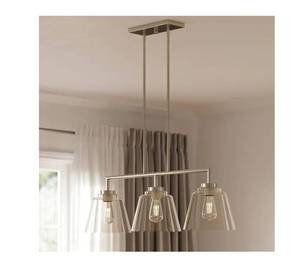 lot 9239 image: allen  roth Bradley 3 -Light Farmhouse Clear Glass Linear Large Hanging Kitchen Island Light - Brushed Nickel missing one glass