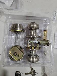 lot 9308 image: Brushed Nickel Door Knob Set with Lock and Keys