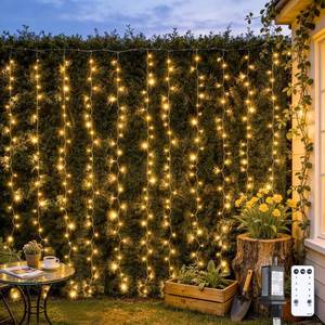 lot 6979 image: JMEXSUSS 300 LED Remote Control Curtain Lights, Plug in Fairy Curtain Lights Outdoor, Window Wall Hanging String Lights for Bedroom Indoor Dorm Backdrop Wedding Party Patio Christmas Decor, Warm White